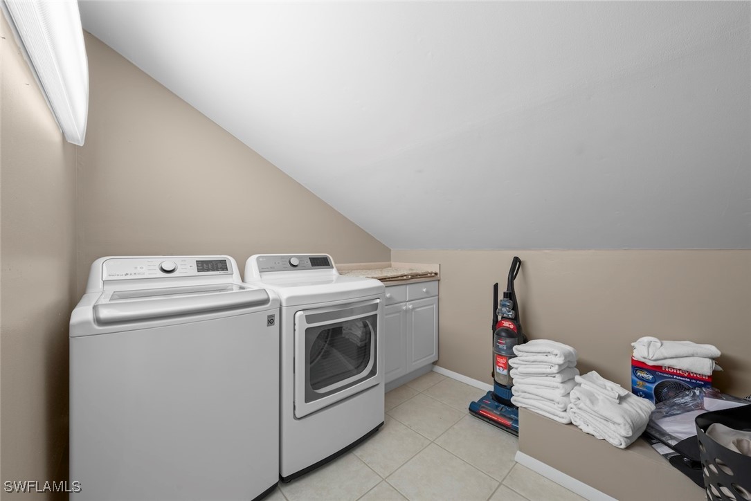 1651 Sand Castle Road Sanibel, FL 33957 - Photo 43 of 50 a utility room with dryer and washer