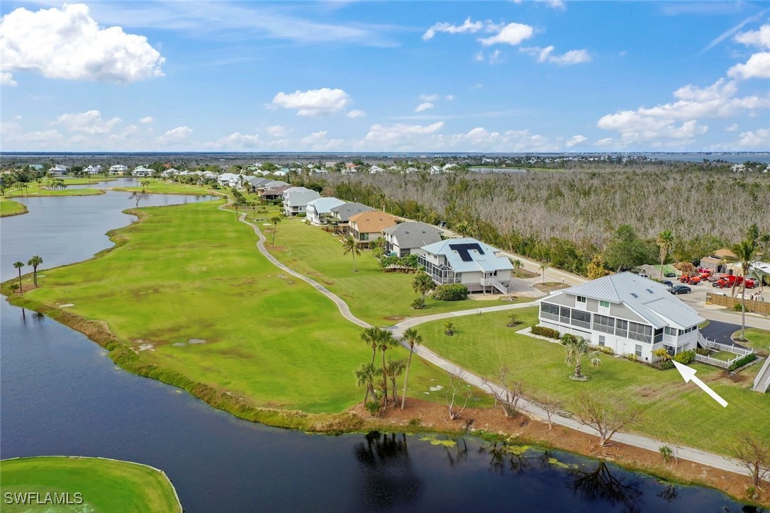 1651 Sand Castle Road Sanibel, FL 33957 - Photo 46 of 50 an aerial view of a house with a swimming pool