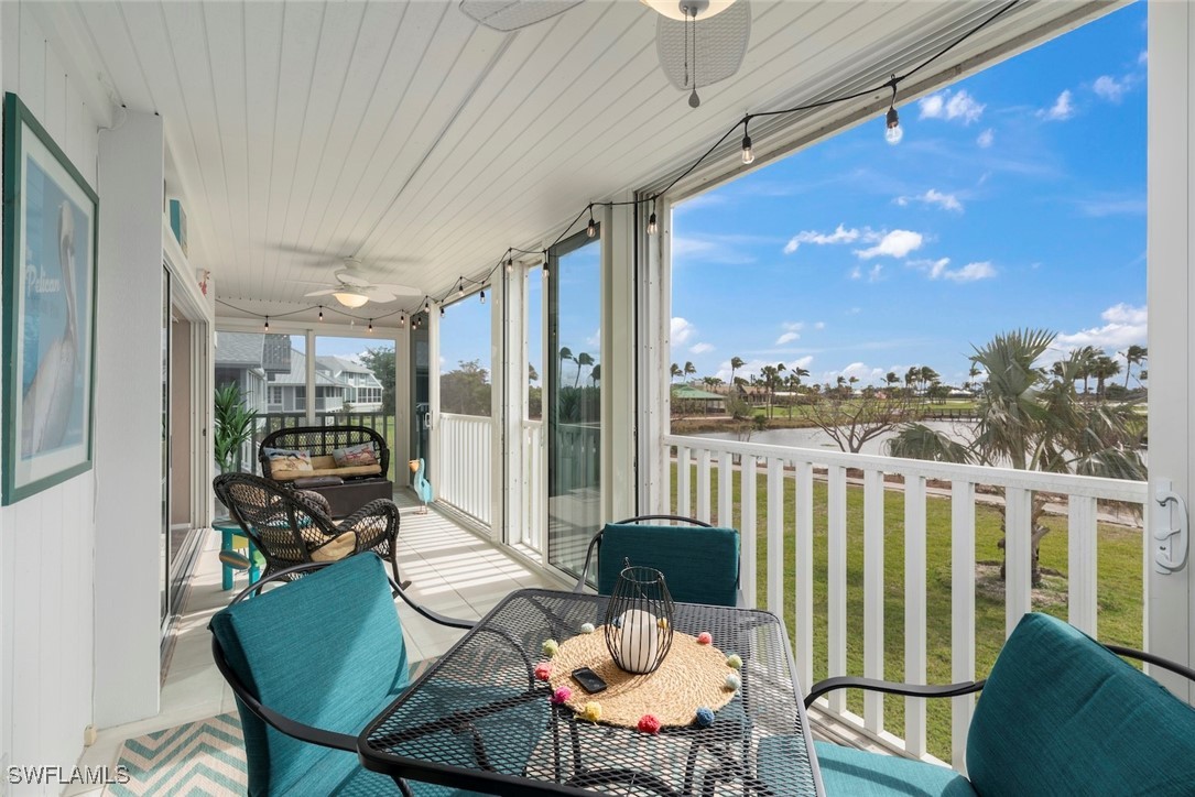 1651 Sand Castle Road Sanibel, FL 33957 - Photo 8 of 50 a outdoor dining space with furniture