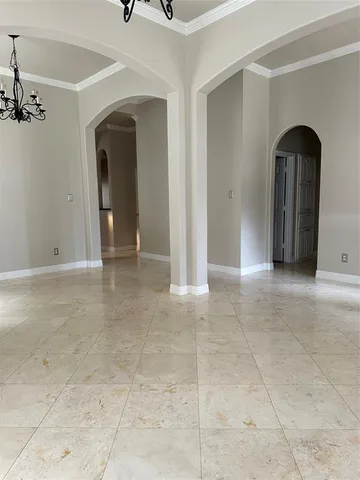 a view of empty room with windows