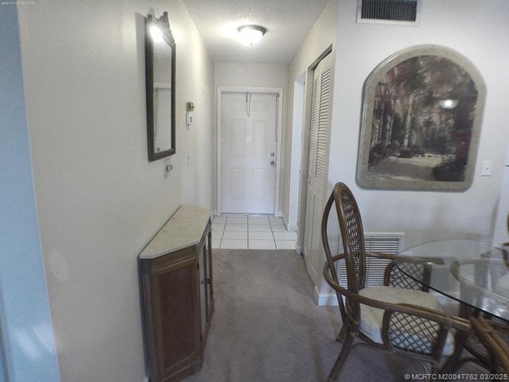 1919 Southwest Palm City Road, Unit H Stuart, FL 34994 - Photo 6 of 27 FOYER