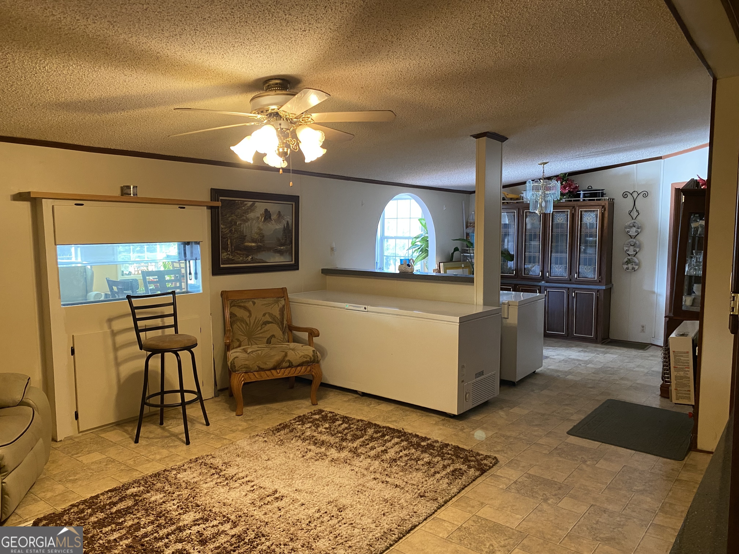 580 Centralia Rachels Road Warthen, GA 31094 - Photo 29 of 40 a living room with furniture and a flat screen tv