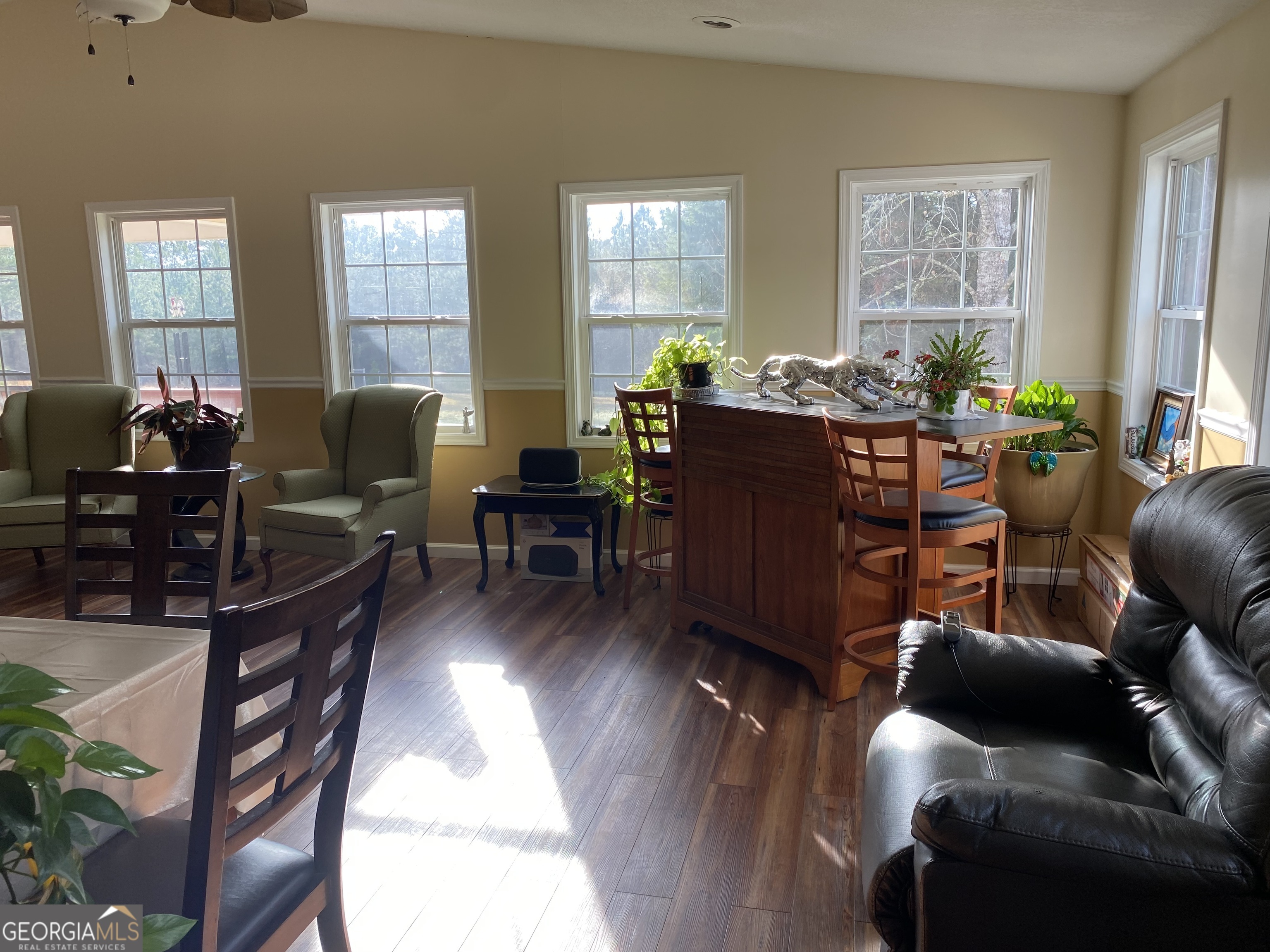 580 Centralia Rachels Road Warthen, GA 31094 - Photo 33 of 40 a living room with furniture dining table and windows