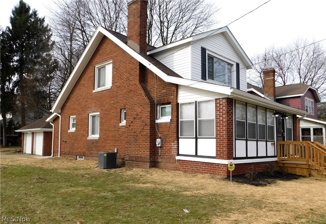1227 Copley Road Akron, OH 44320 - Photo 3 of 35 Brick home with vinyl accents, easy exterior maintenance. Spacious corner lot!