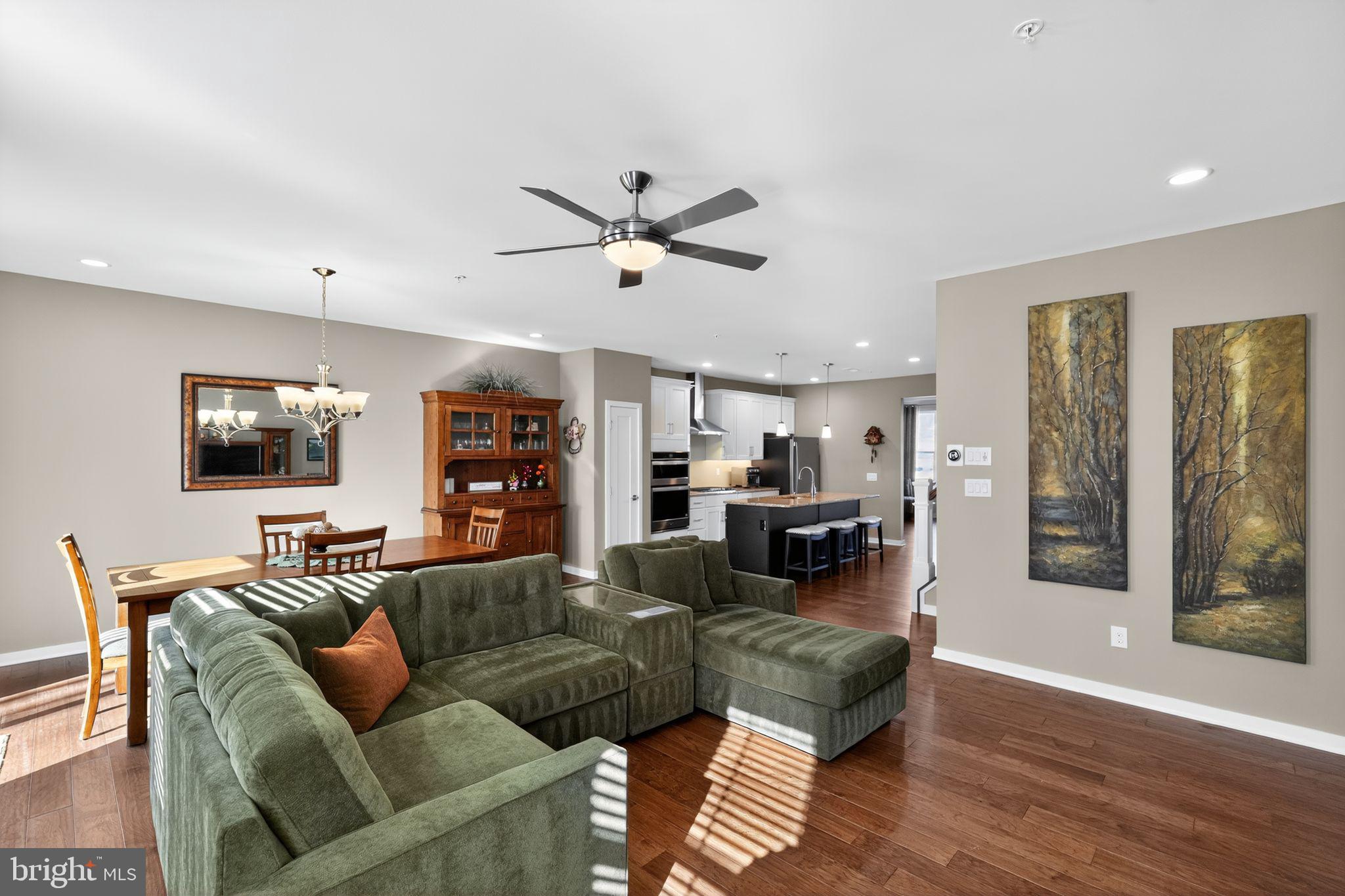 417 Wynstone Court Colmar, PA 18915 - Photo 11 of 30 a living room with furniture kitchen view and a flat screen tv