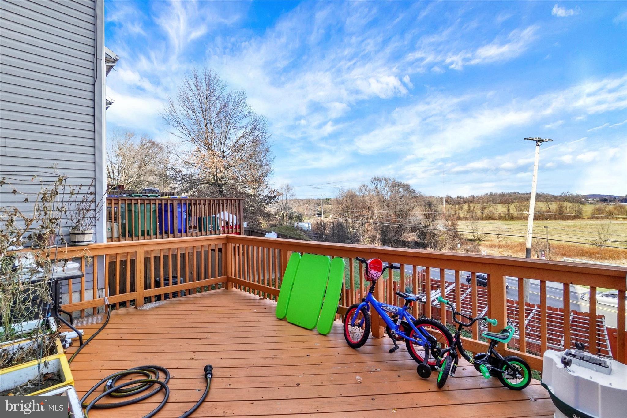 2455 Woodmont Drive York, PA 17404 - Photo 18 of 28 a view of city from a balcony with furniture