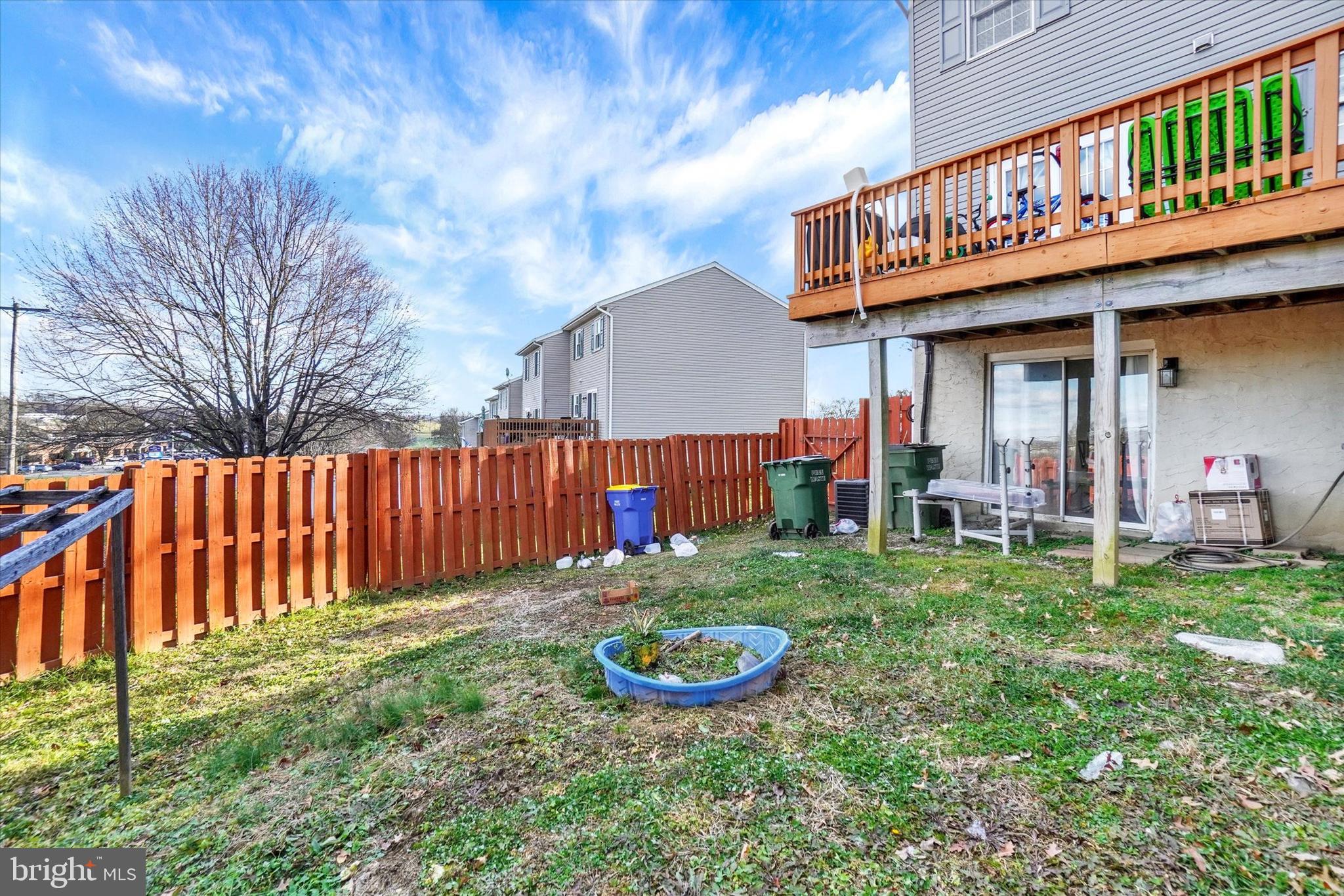 2455 Woodmont Drive York, PA 17404 - Photo 21 of 28 a view of a house with a backyard and a patio