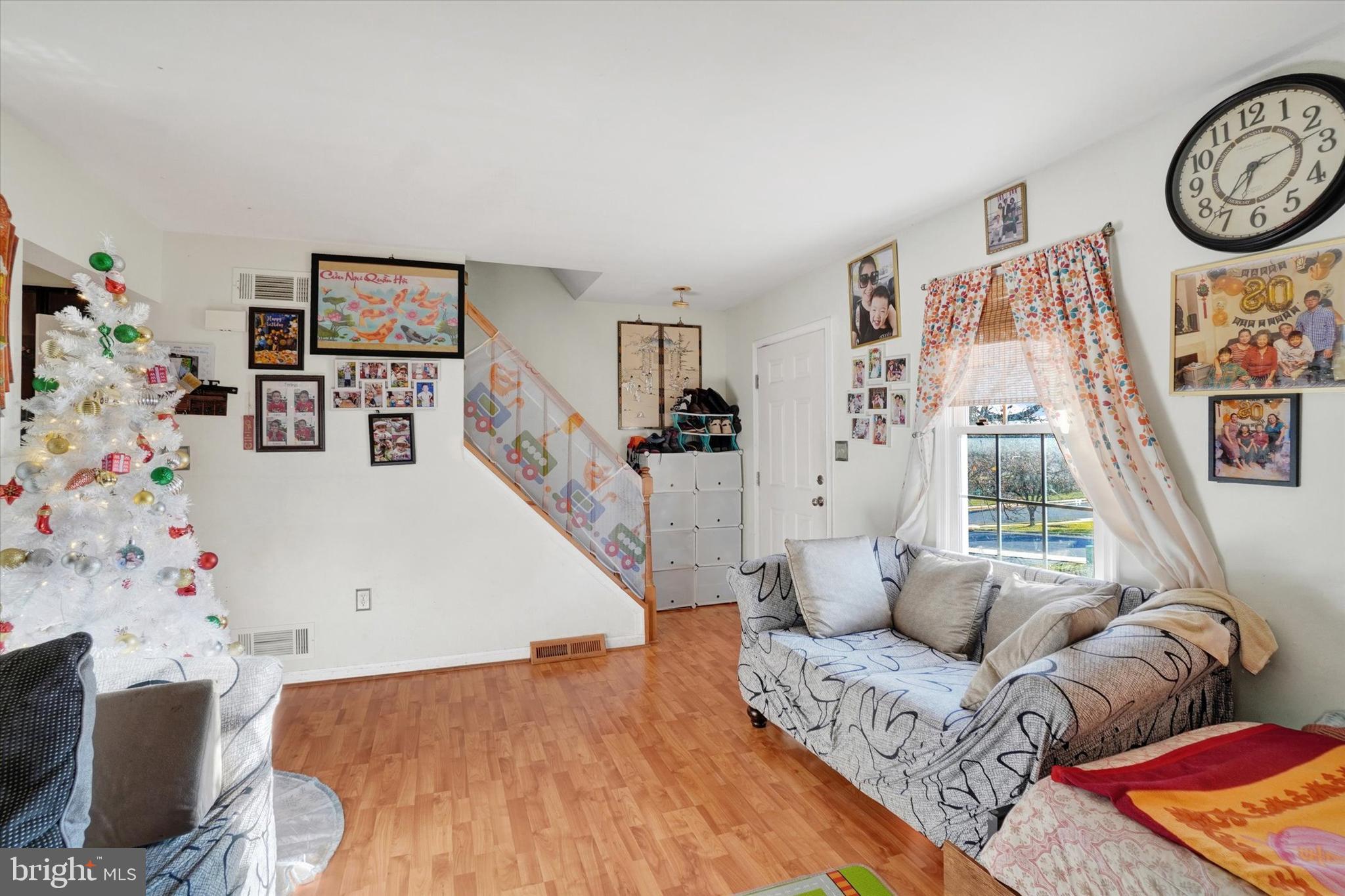 2455 Woodmont Drive York, PA 17404 - Photo 3 of 28 a living room with furniture and wooden floor