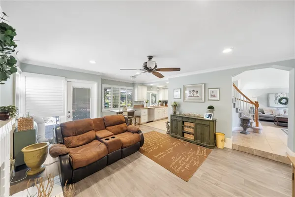 a living room with furniture rug and window