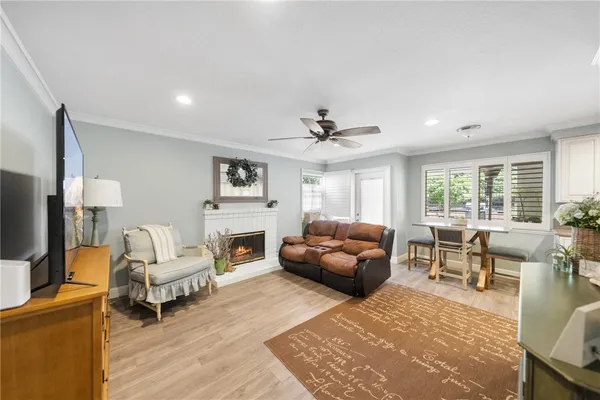 a view of a livingroom with furniture and a flat screen tv