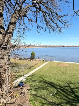 a view of swimming pool with a yard