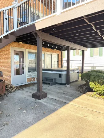 a view of a balcony with chairs