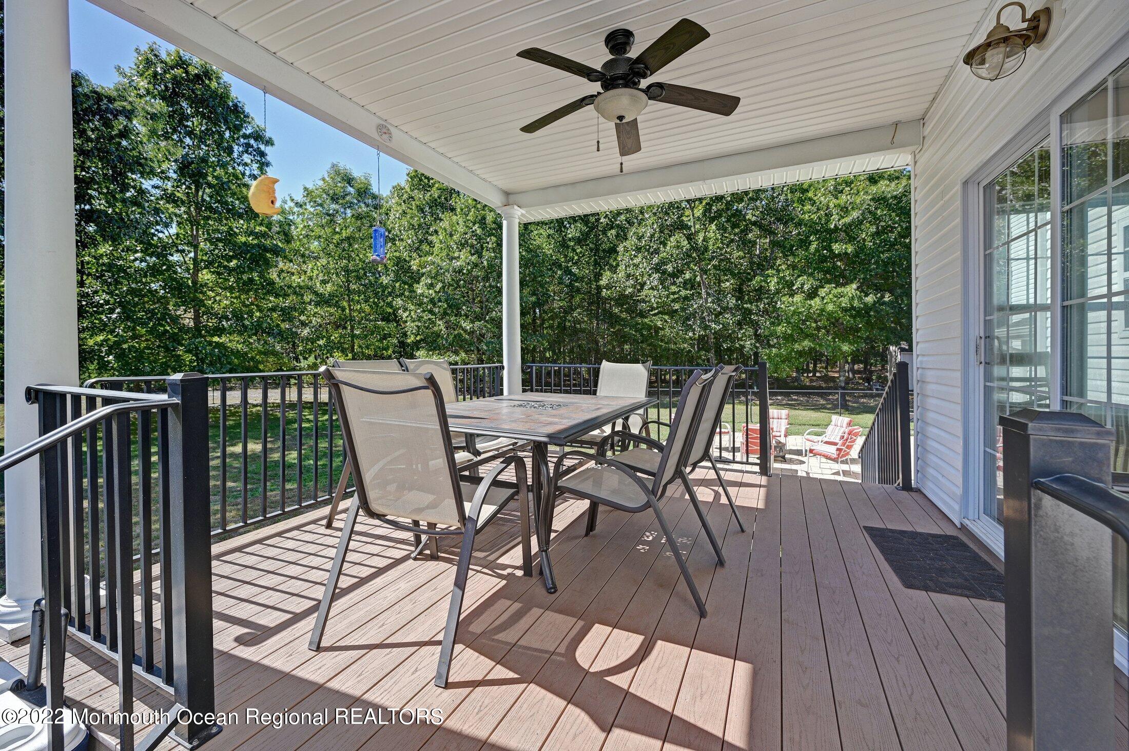 601 Reed Road Jackson, NJ 08527 - Photo 35 of 43 a view of a dining room with furniture window and wooden floor