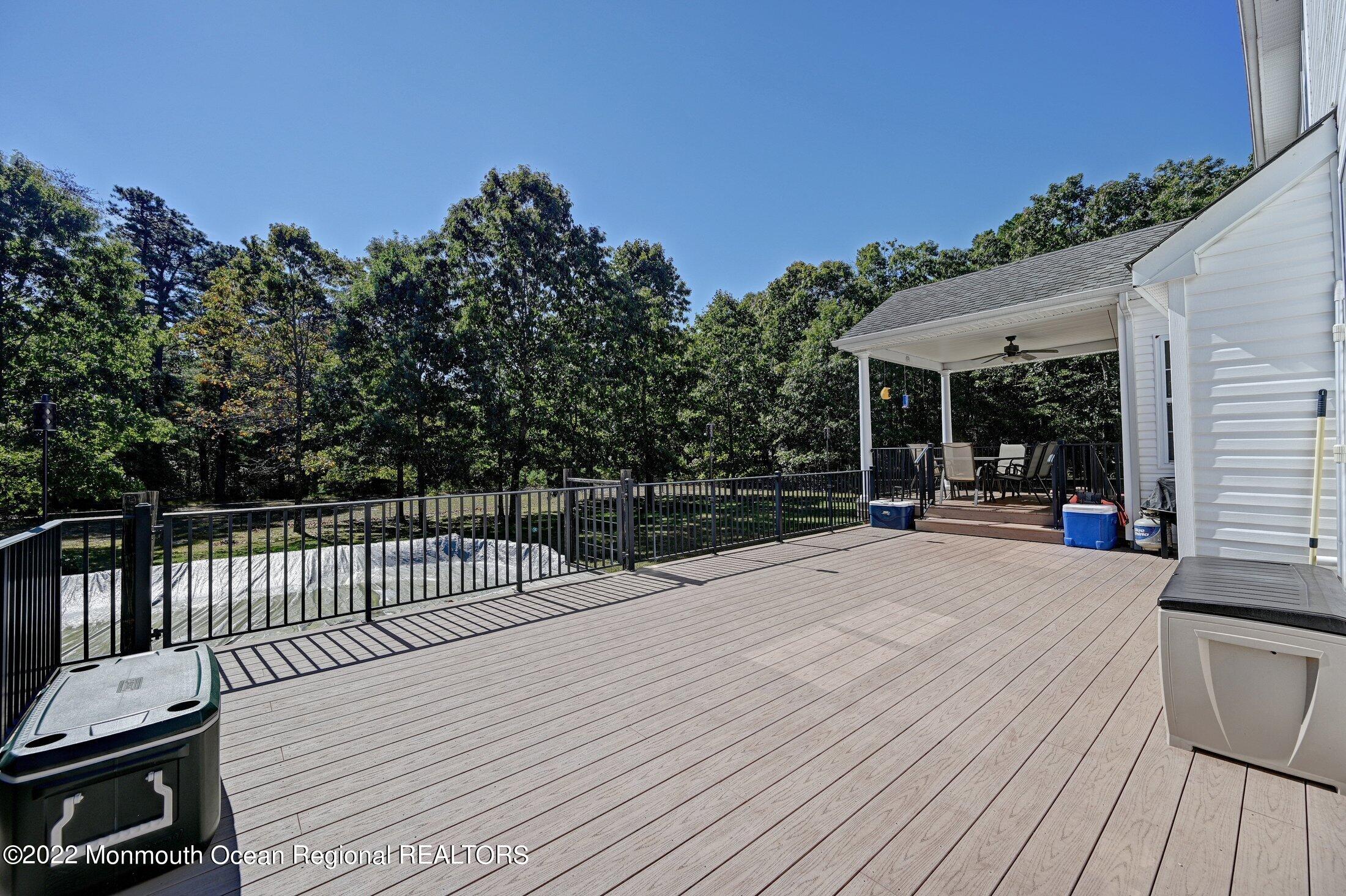 601 Reed Road Jackson, NJ 08527 - Photo 36 of 43 a balcony with wooden floor