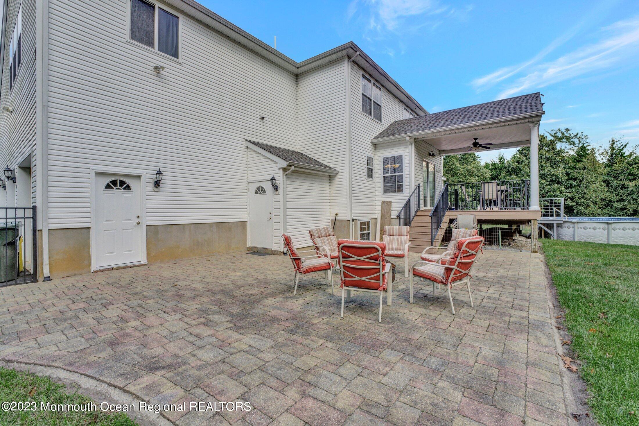 601 Reed Road Jackson, NJ 08527 - Photo 38 of 43 a backyard of a house with outdoor seating