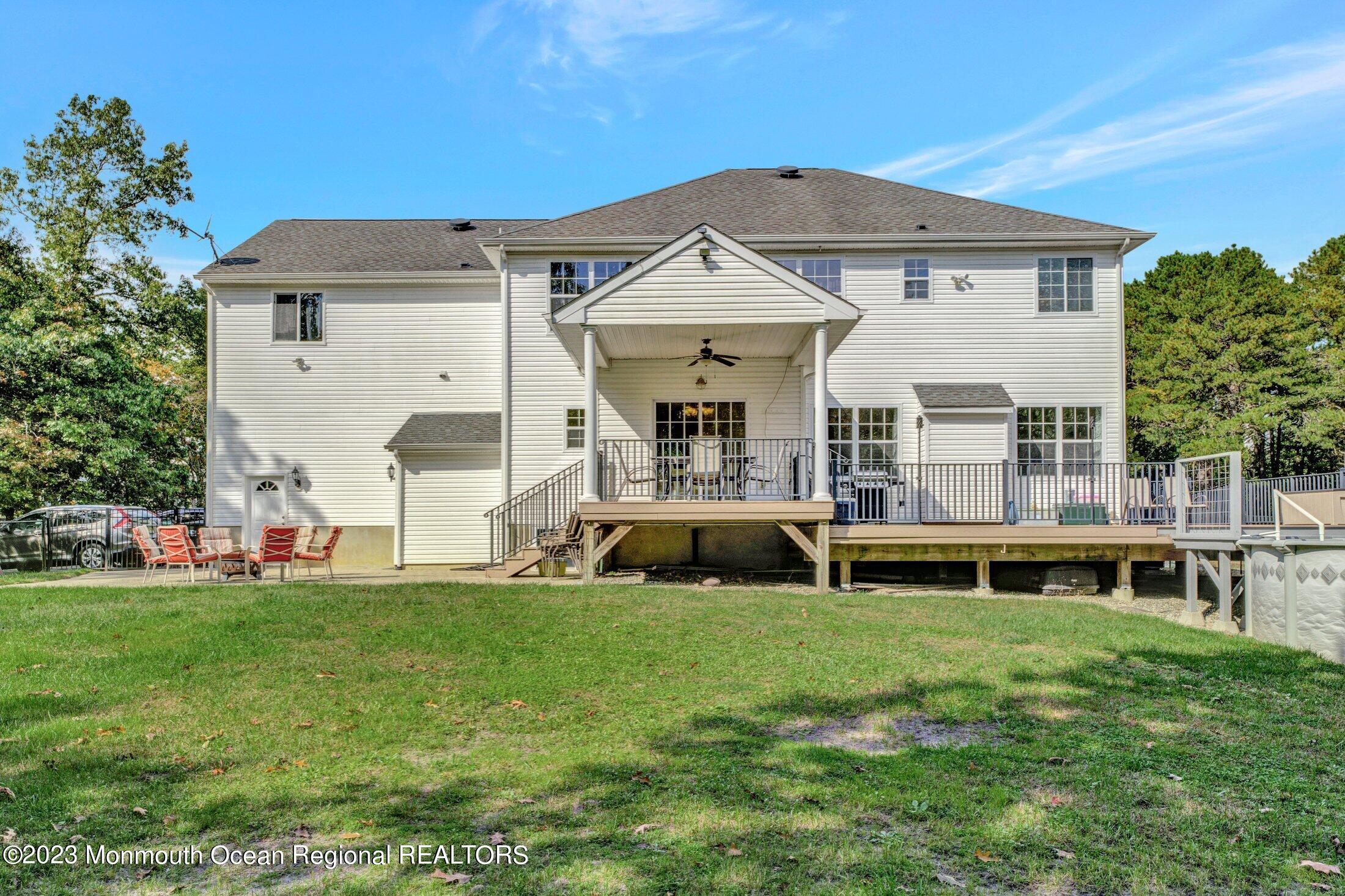 601 Reed Road Jackson, NJ 08527 - Photo 39 of 43 a front view of a house with a yard