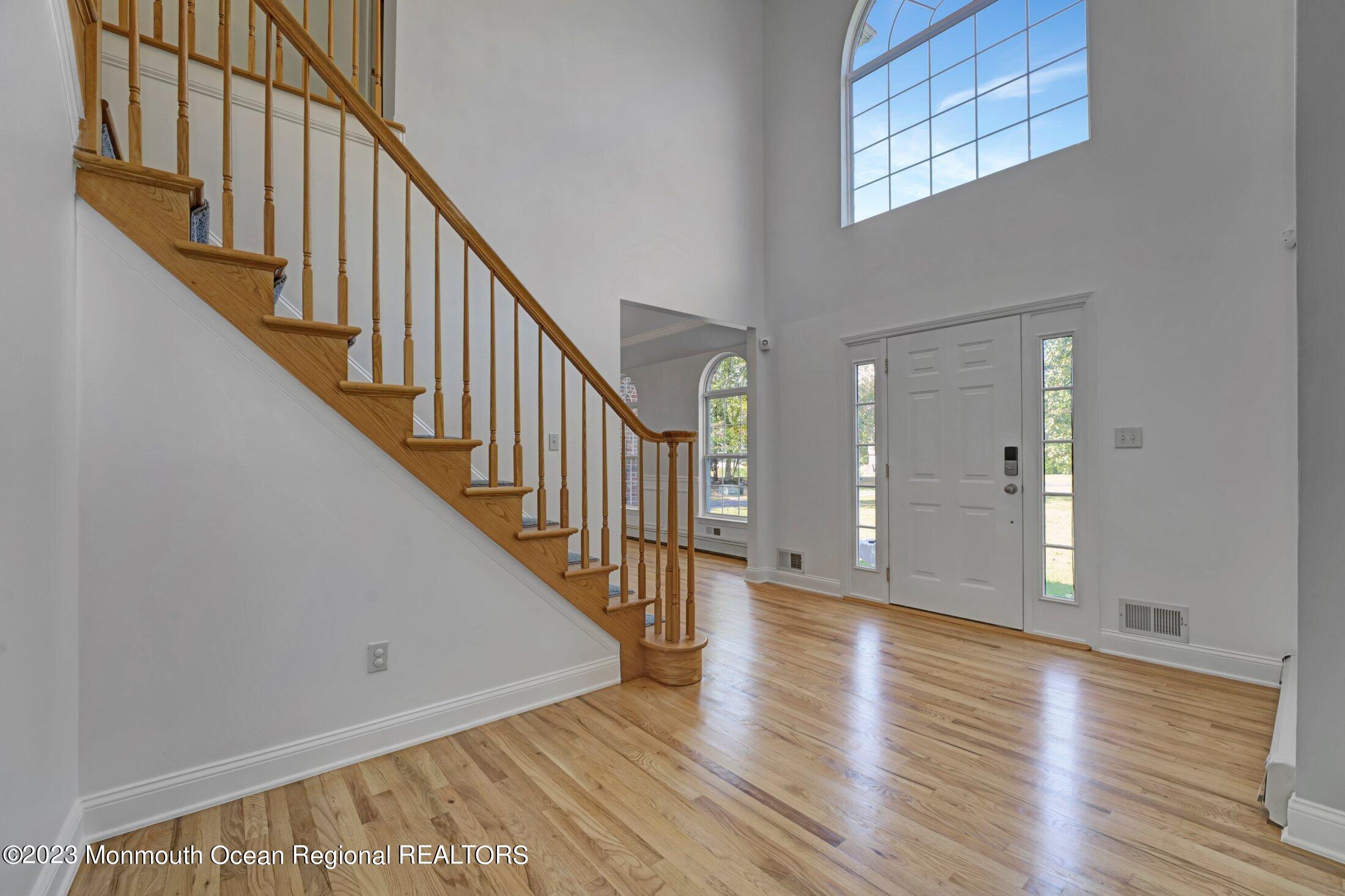 601 Reed Road Jackson, NJ 08527 - Photo 4 of 43 a view of an entryway with wooden floor
