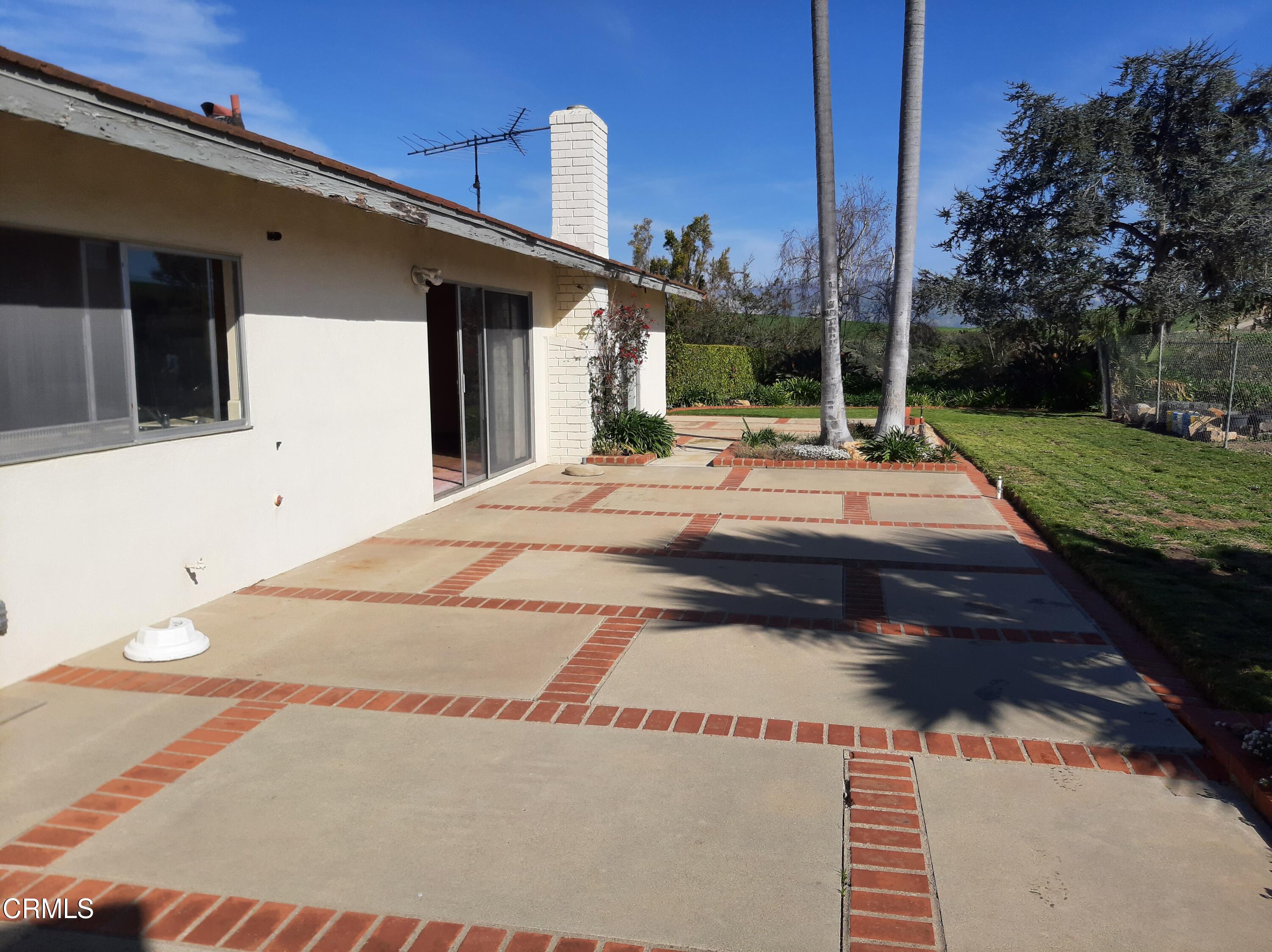 3166 Old Coach Drive Camarillo, CA 93010 - Photo 19 of 55 a view of a house with a yard and porch