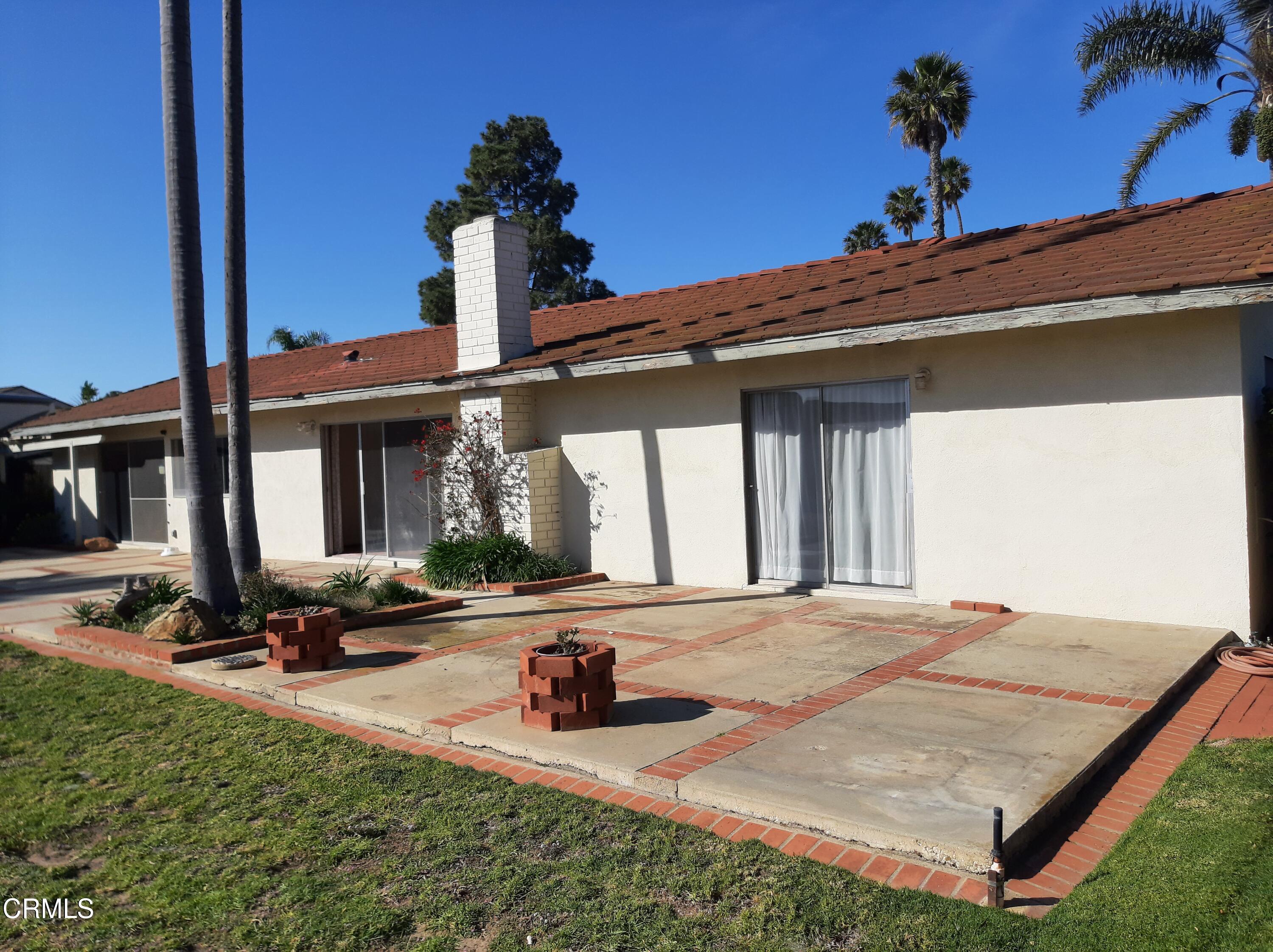 3166 Old Coach Drive Camarillo, CA 93010 - Photo 20 of 55 a view of a house with backyard sitting area and garden