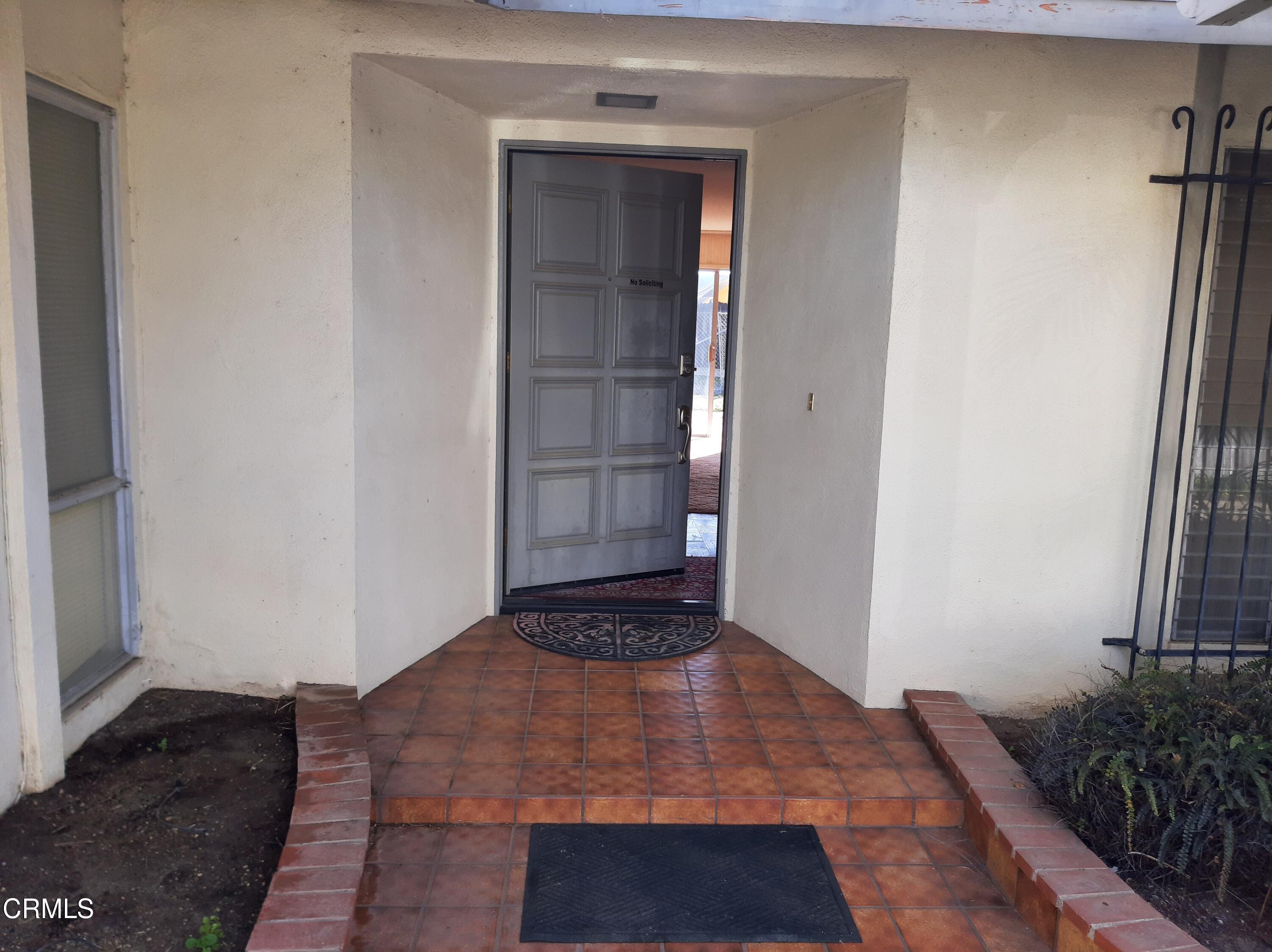 3166 Old Coach Drive Camarillo, CA 93010 - Photo 9 of 55 a view of a hallway with wooden floor and closet