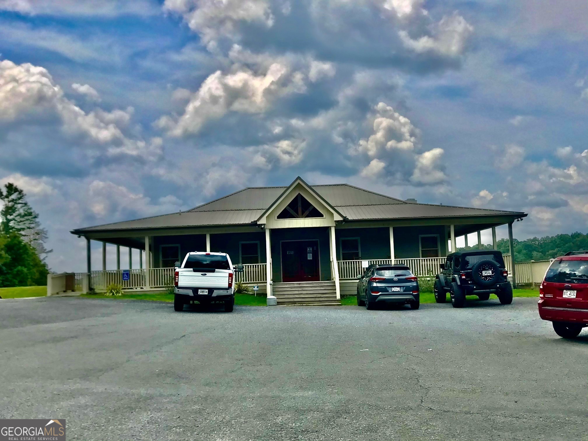 573 Cataula Court Ellijay, GA 30540 - Photo 9 of 13 a car parked in front of the house