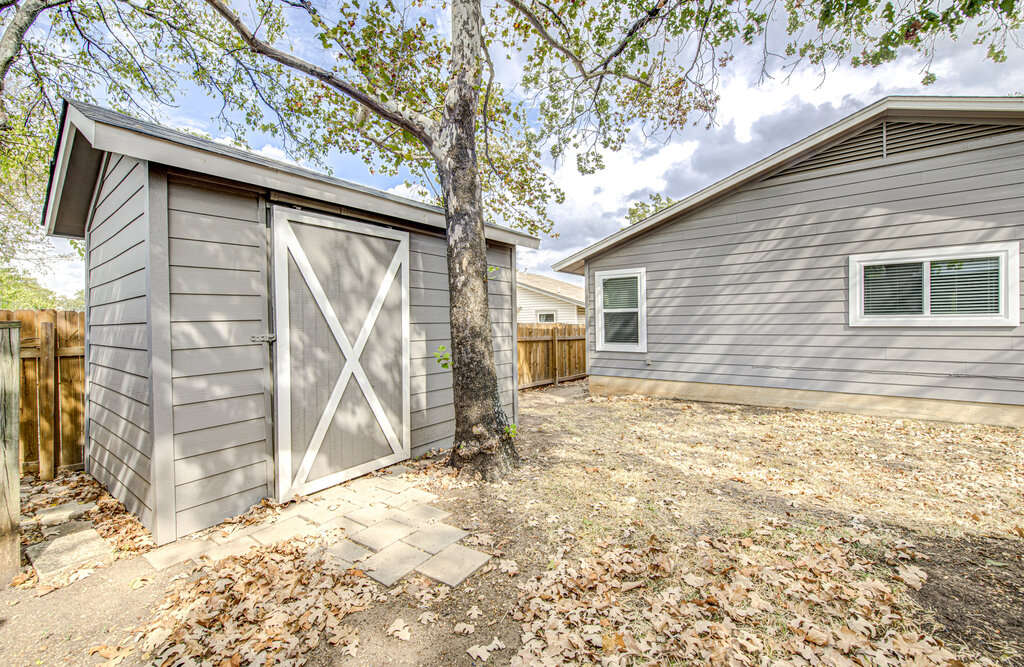 12925 Covington Trail Austin, TX 78727 - Photo 27 of 28 View of shed featuring a fenced backyard