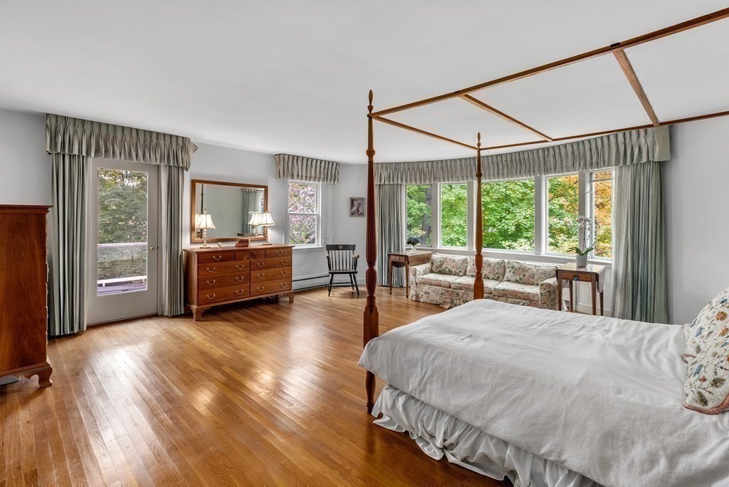 260 Lee Street Brookline, MA 02445 - Photo 14 of 22 a bedroom with a bed and large window