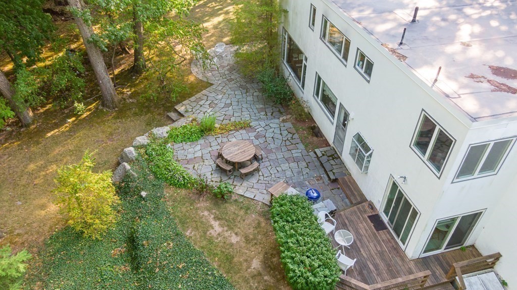 260 Lee Street Brookline, MA 02445 - Photo 21 of 22 a backyard of a house with lots of green space