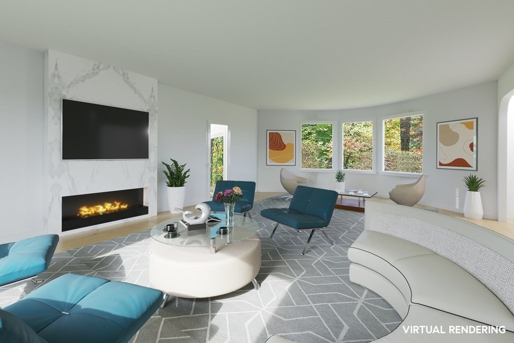 260 Lee Street Brookline, MA 02445 - Photo 8 of 22 a living room with furniture a fireplace and a flat screen tv