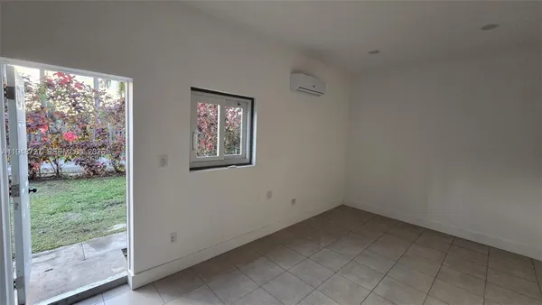 an empty room with a window