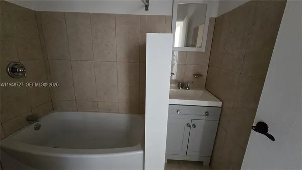 a bathroom with a bathtub