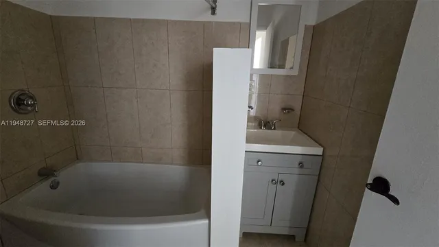 a bathroom with a bathtub
