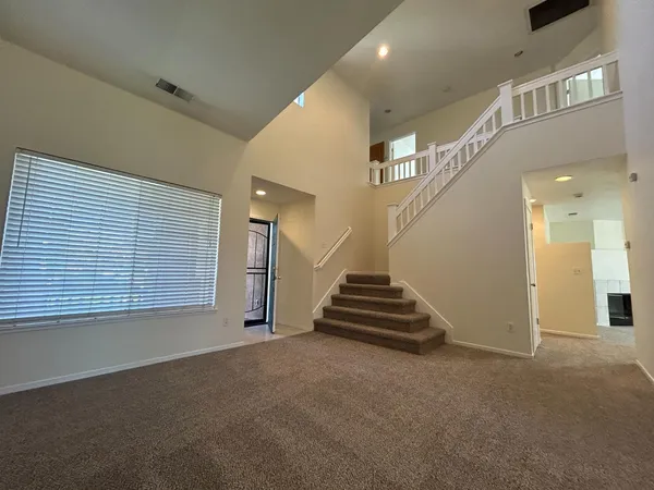 a view of an entryway with stairs