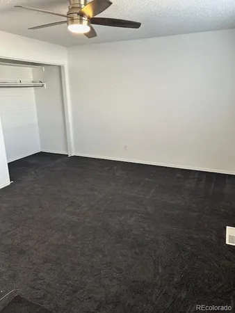a view of a room with an empty space