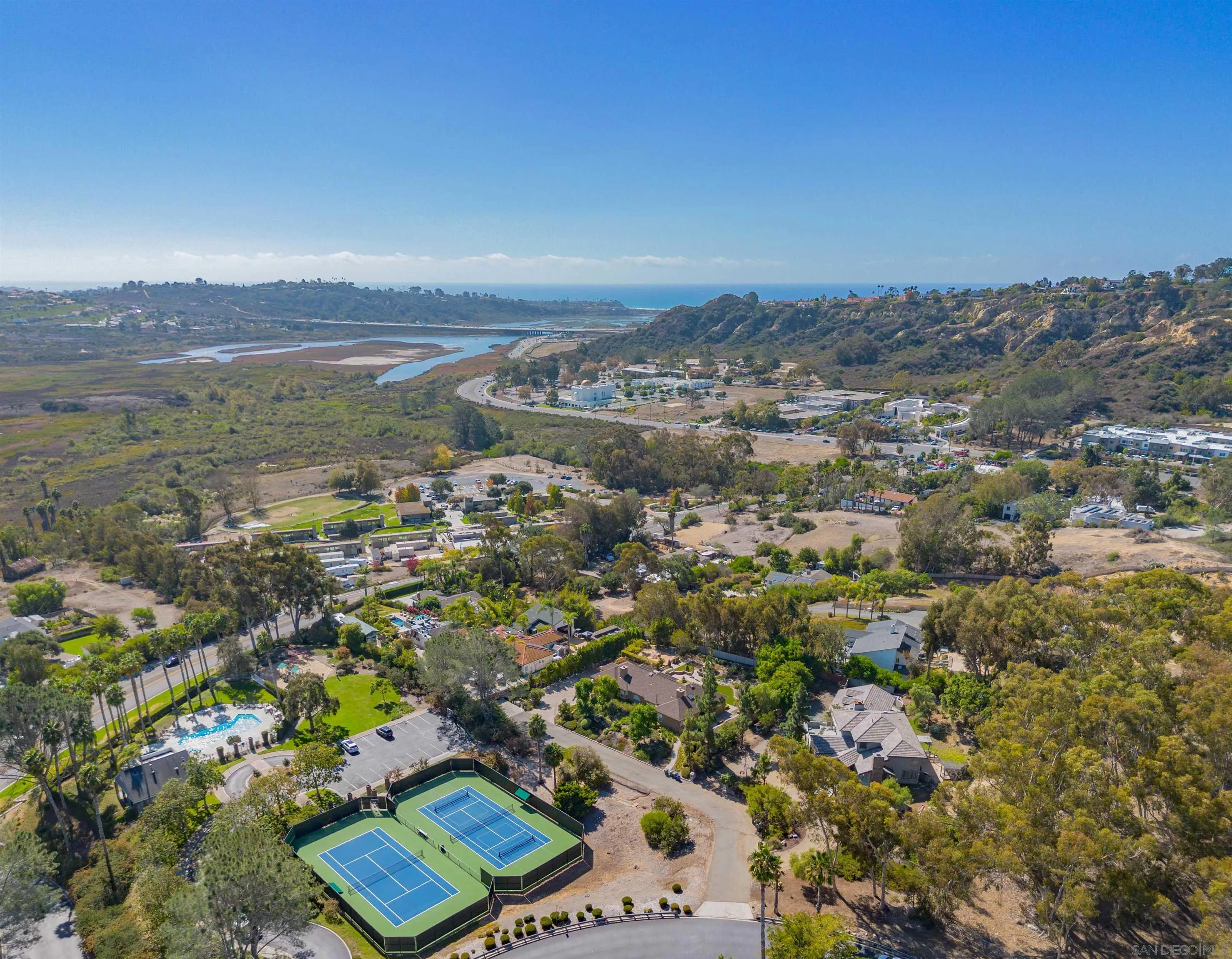3703 Manchester Avenue, Unit 1 Encinitas, CA 92024 - Photo 12 of 23 an aerial view of residential building with green space