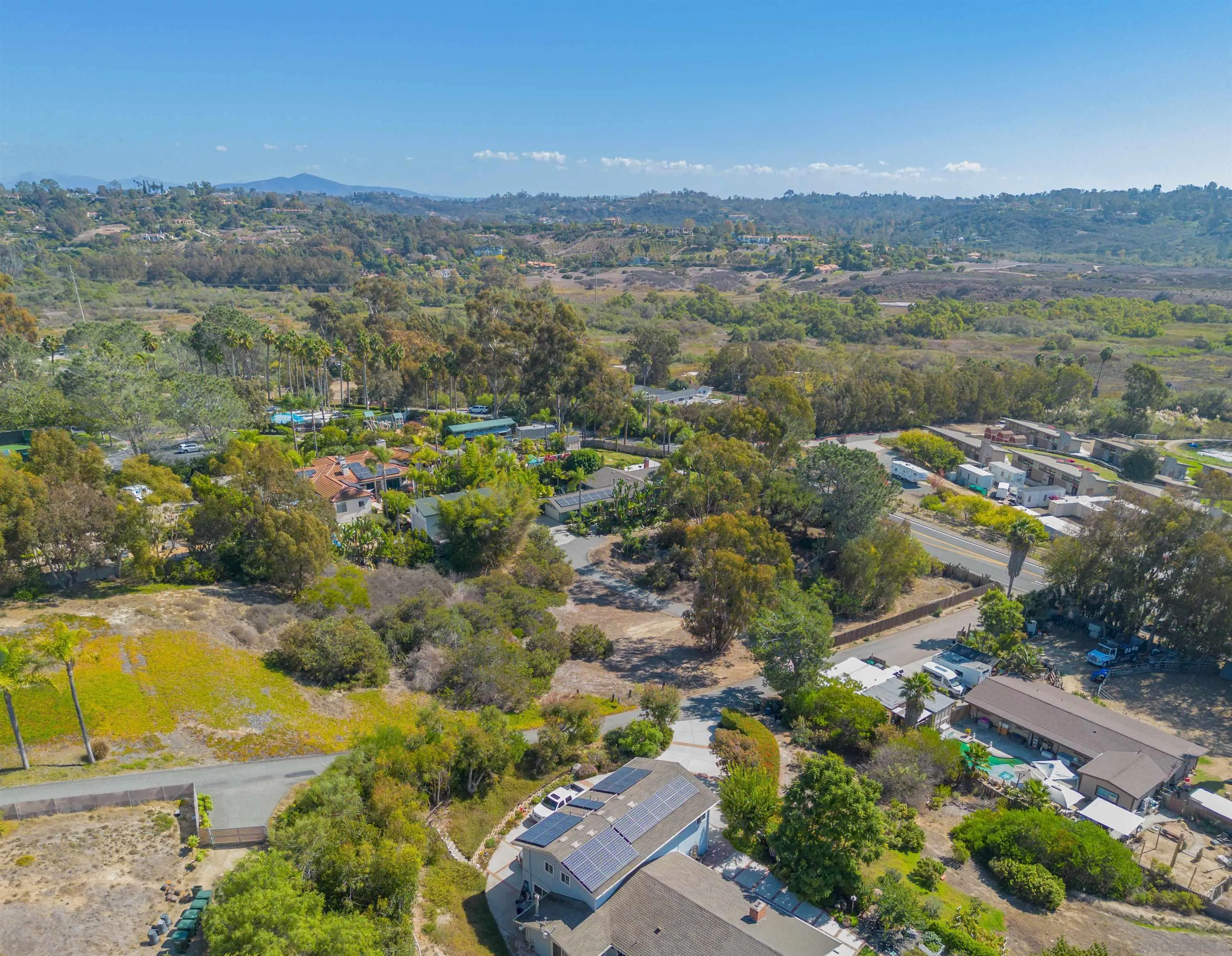 3703 Manchester Avenue, Unit 1 Encinitas, CA 92024 - Photo 19 of 23 a view of a city with mountains in the background