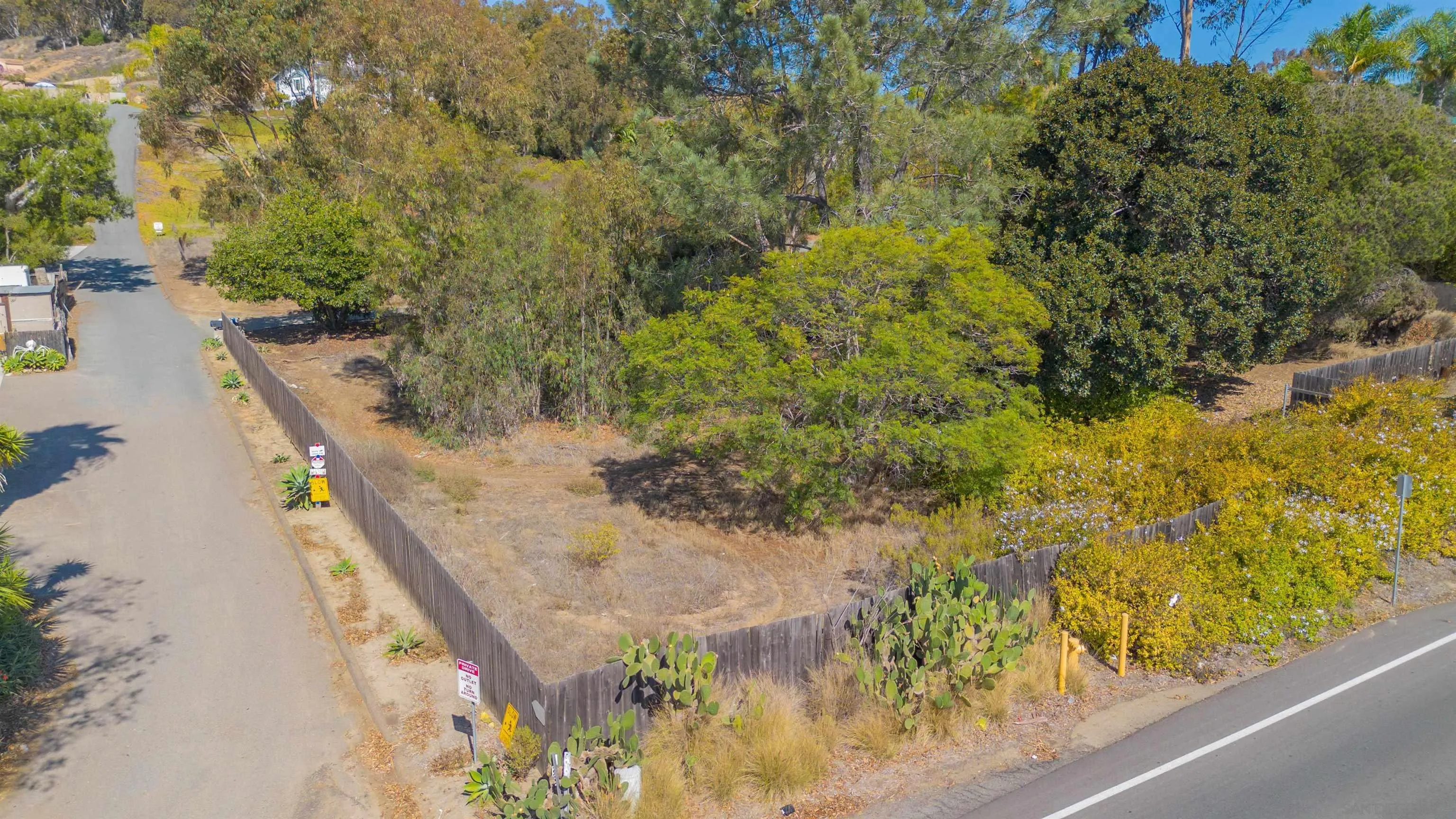3703 Manchester Avenue, Unit 1 Encinitas, CA 92024 - Photo 9 of 23 a view of a lake with a house in the background