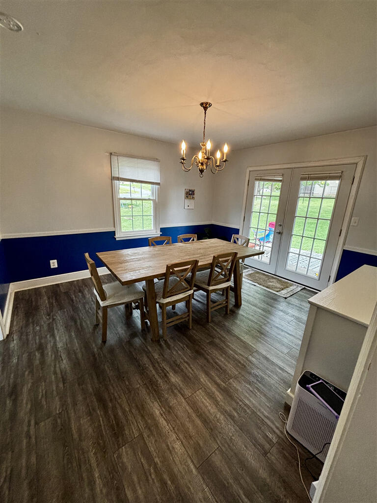1032 Windy Ridge Drive Bedford, VA 24523 - Photo 11 of 27 a view of a dining room with furniture and window