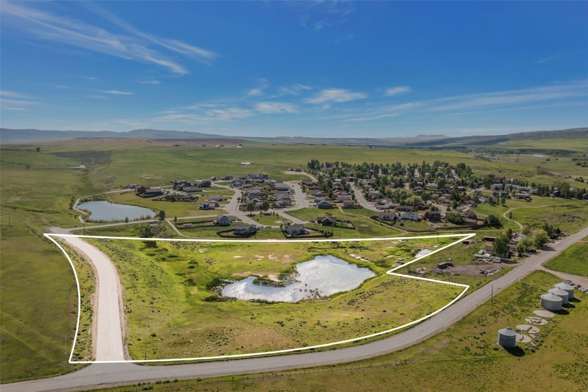 Tbd Hayden Parkway Hayden, CO 81639 - Photo 1 of 11 a view of a swimming pool with a table and chairs