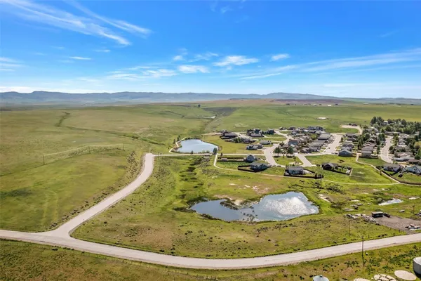 a view of a swimming pool with an ocean view