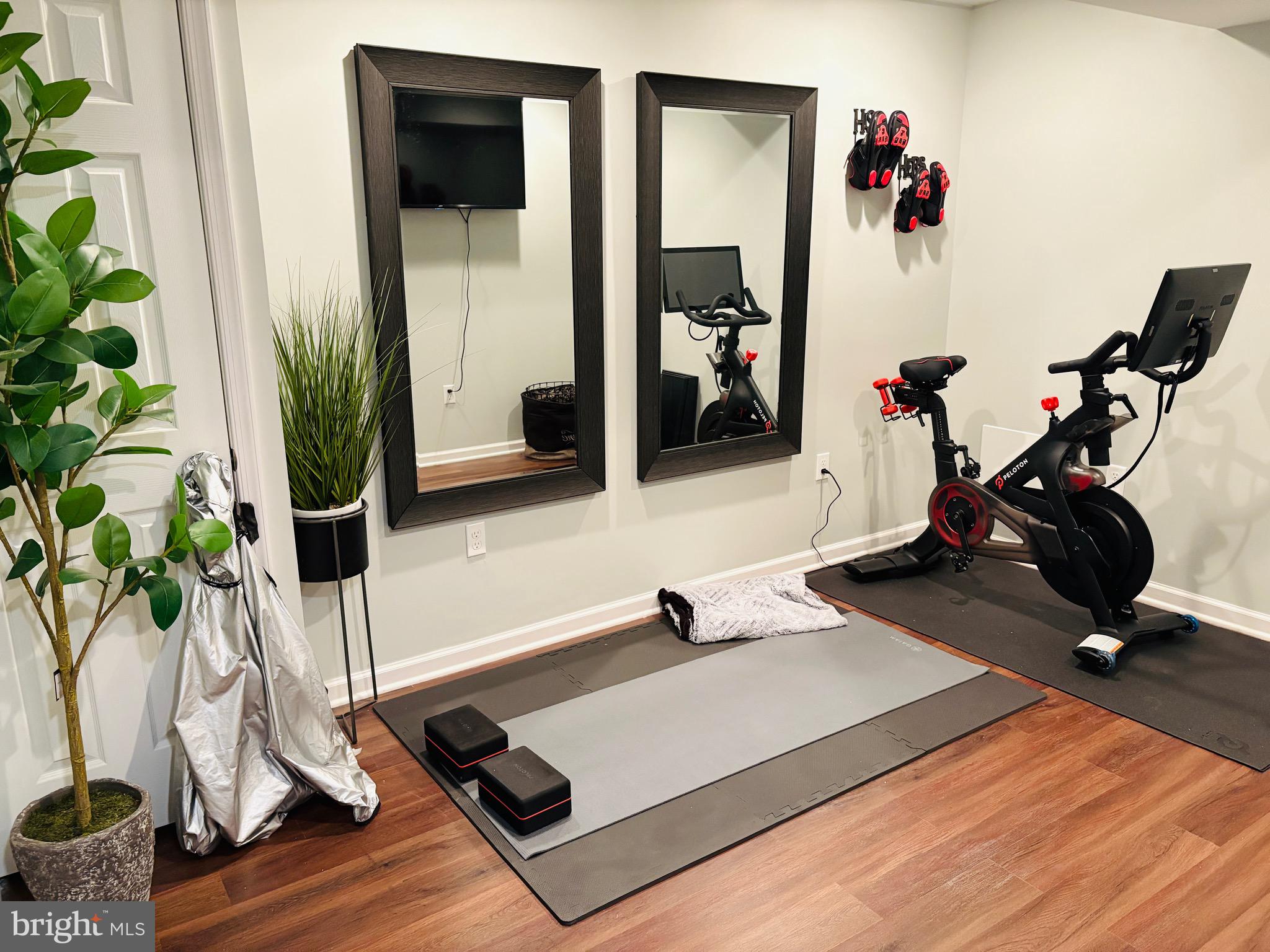 10 Cantera Way Hanover, PA 17331 - Photo 12 of 14 a room with gym equipment and a potted plant