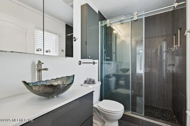 a bathroom with a shower curtain