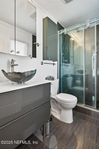 a utility room with closet dryer and washer