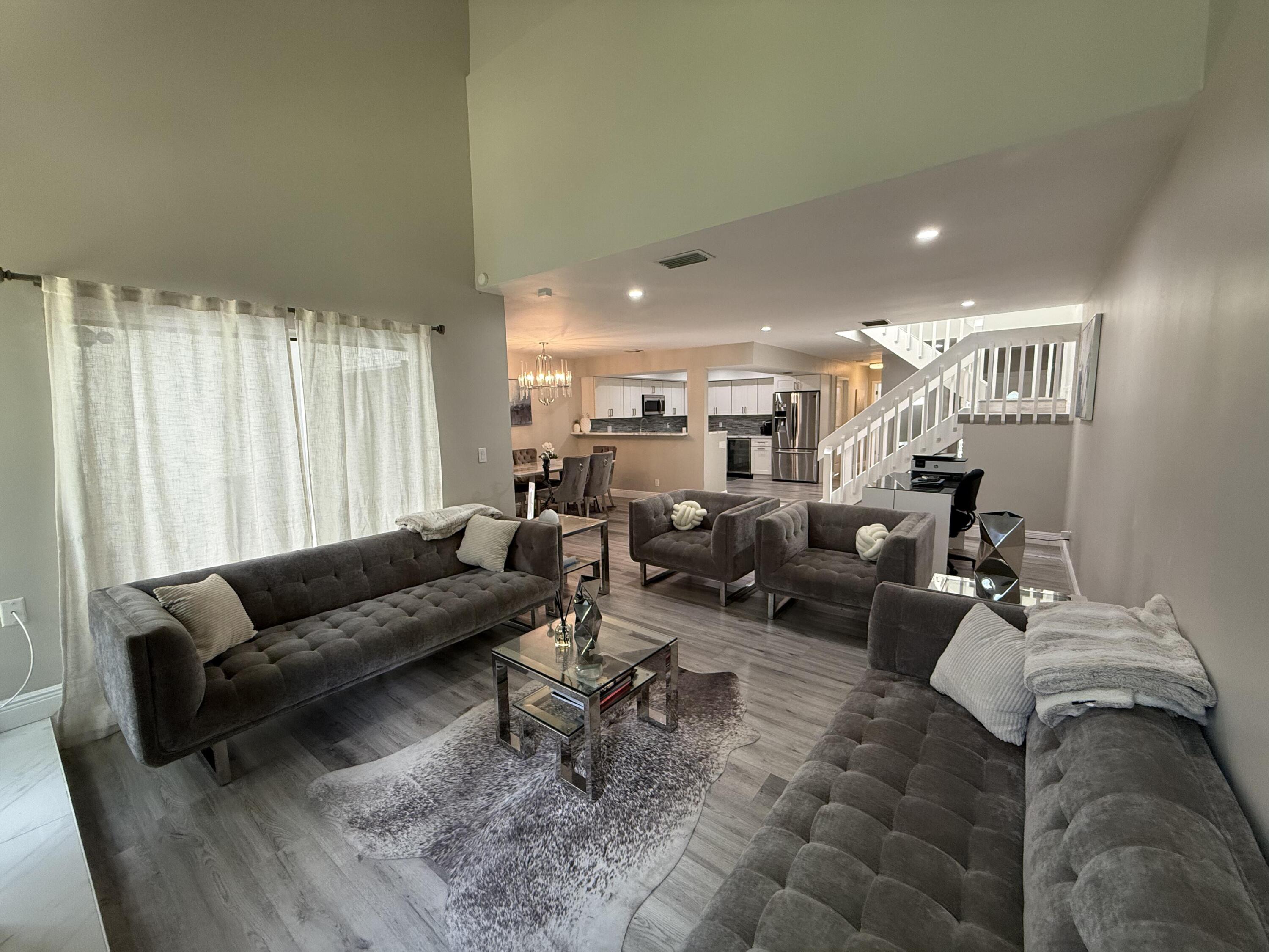 22874 Ironwedge Drive Boca Raton, FL 33433 - Photo 15 of 52 a living room with furniture and a couch