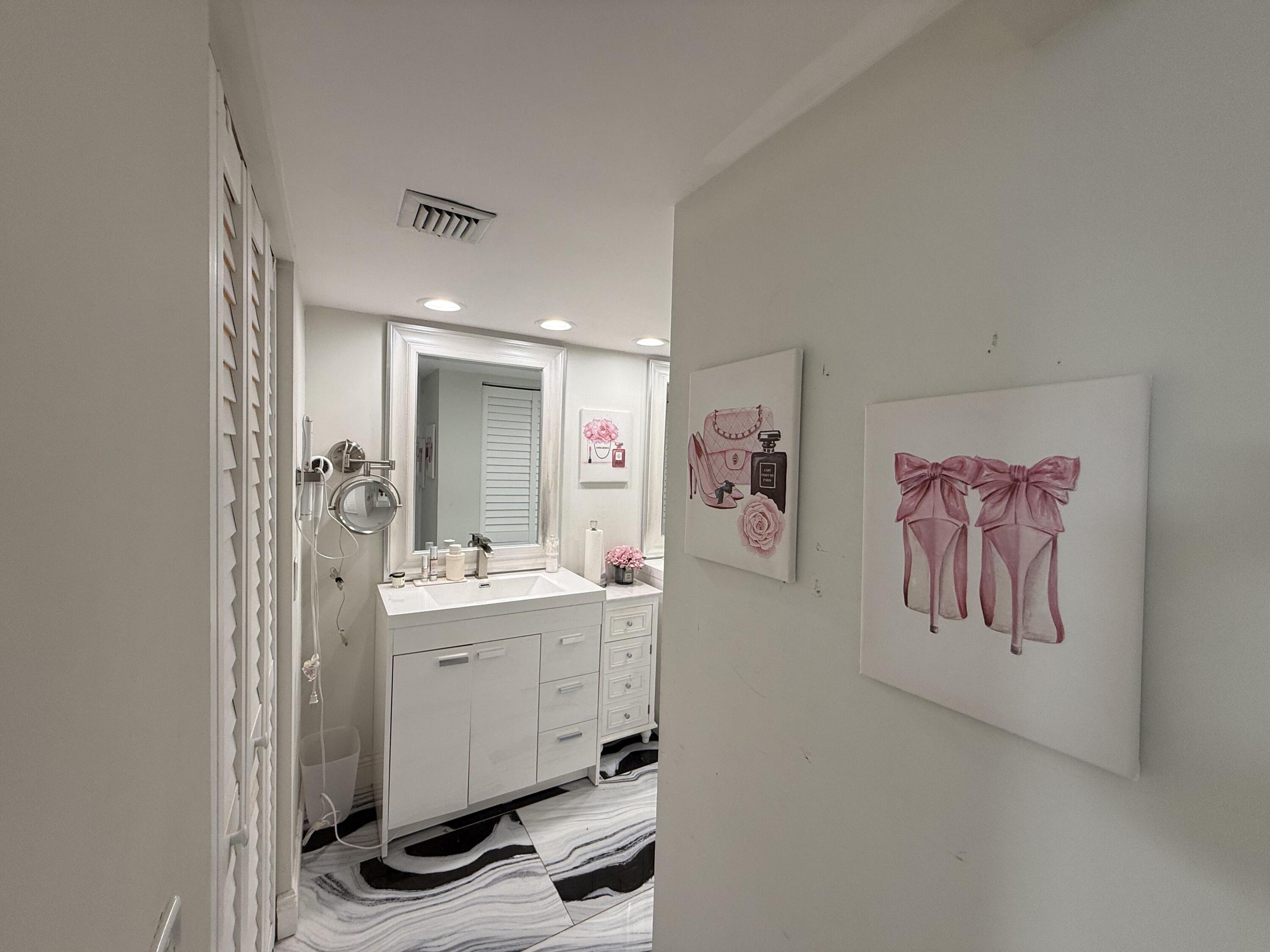 22874 Ironwedge Drive Boca Raton, FL 33433 - Photo 24 of 52 a view of room with painting on the wall and a workspace