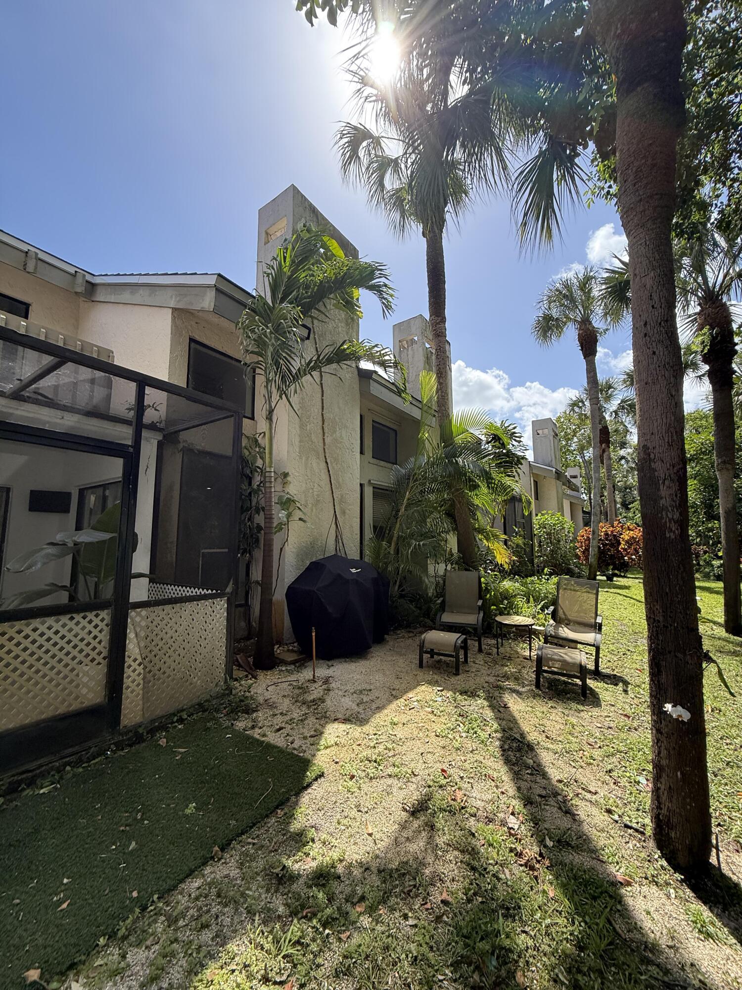 22874 Ironwedge Drive Boca Raton, FL 33433 - Photo 46 of 52 a view of a house with a yard