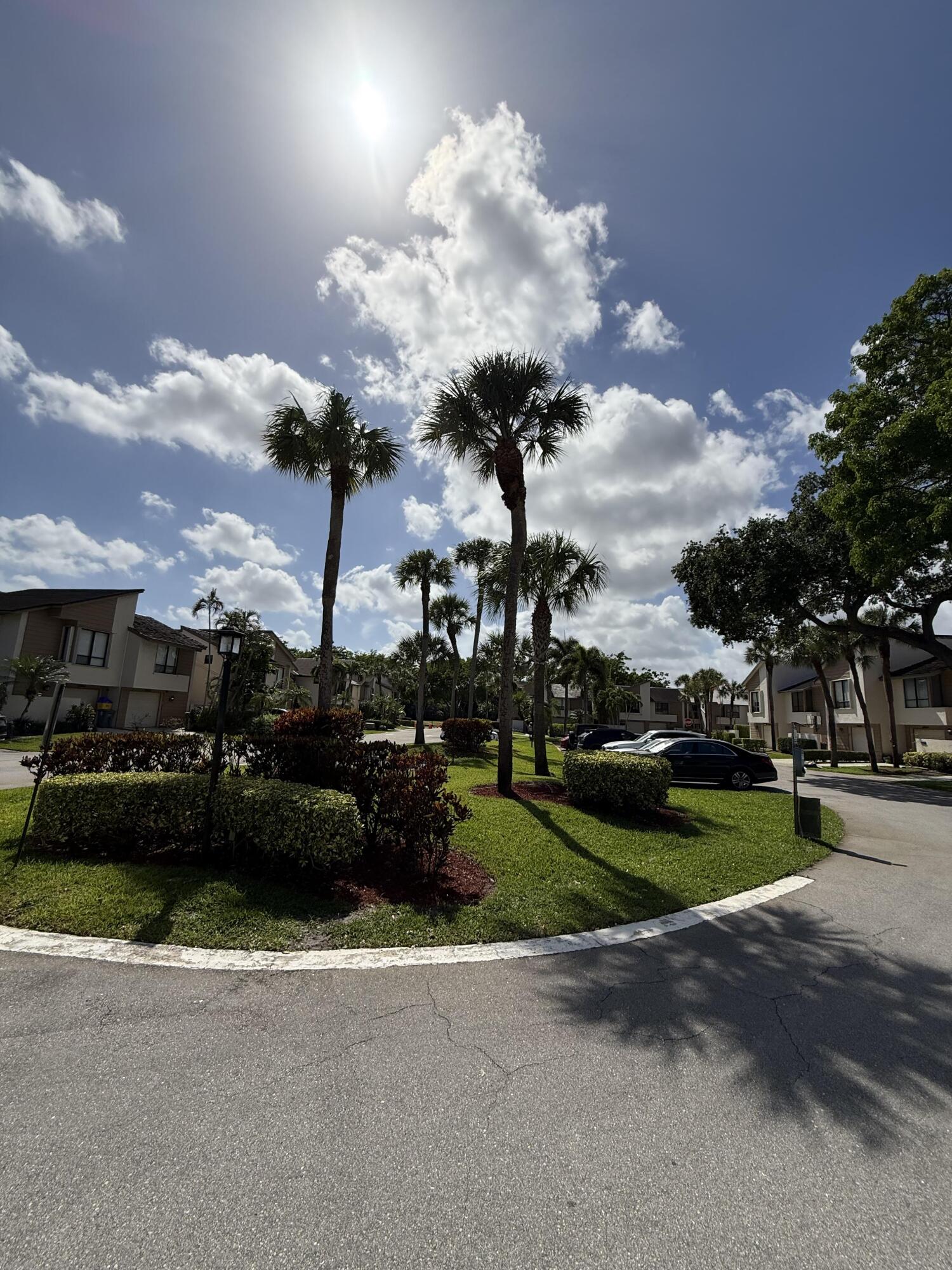 22874 Ironwedge Drive Boca Raton, FL 33433 - Photo 51 of 52 a view of a street with a car parked