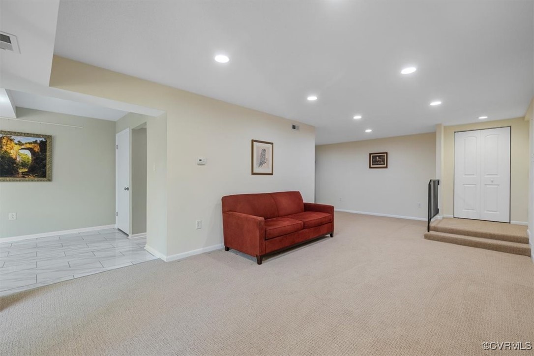 1501 Thistle Road, Unit 203 Richmond, VA 23238 - Photo 2 of 30 a living room with furniture and a couch