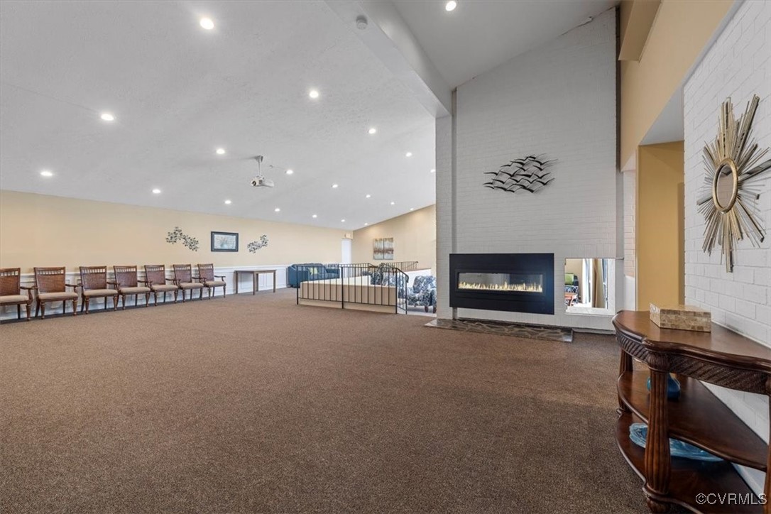1501 Thistle Road, Unit 203 Richmond, VA 23238 - Photo 25 of 30 a view of a livingroom with furniture and a fireplace