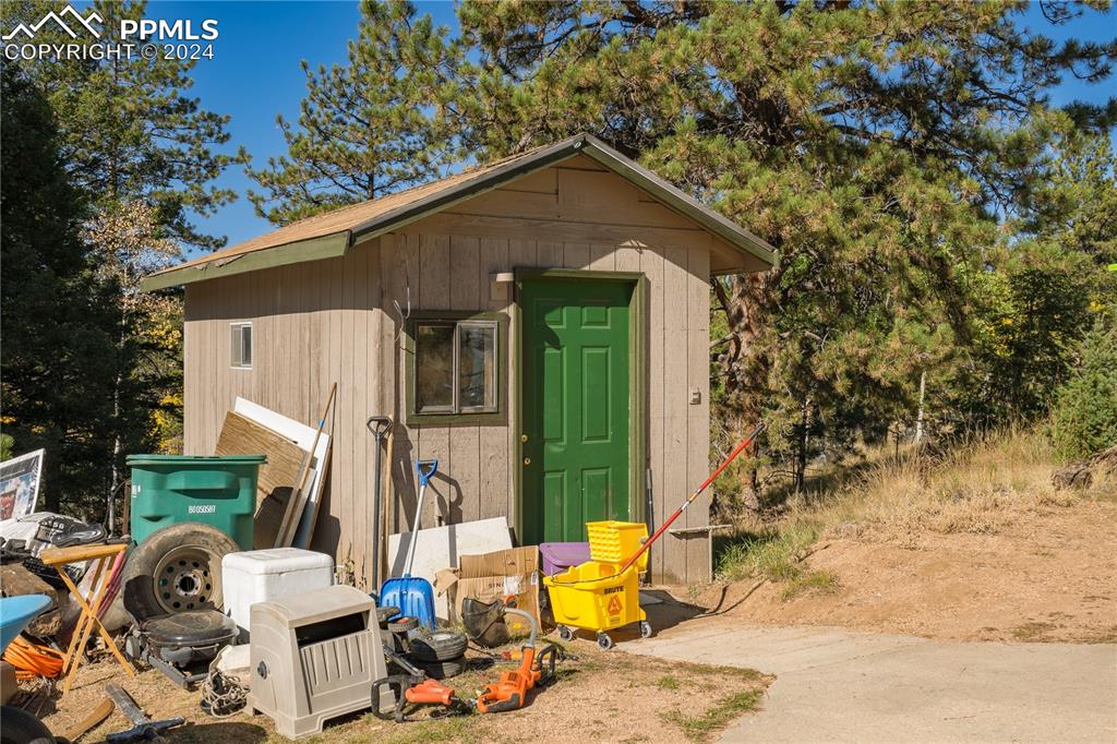 455 Golden Bell Lane Divide, CO 80814 - Photo 25 of 30 a front view of a house with a yard